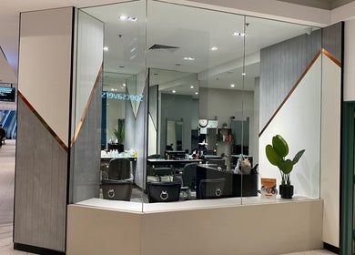 Vogue Hair&Beauty Salon's sleek exterior in Melbourne, Victoria, AU, showcasing modern design and inviting interior.