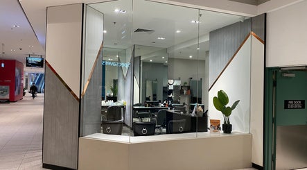 Vogue Hair&Beauty Salon's sleek exterior in Melbourne, Victoria, AU, showcasing modern design and inviting interior.