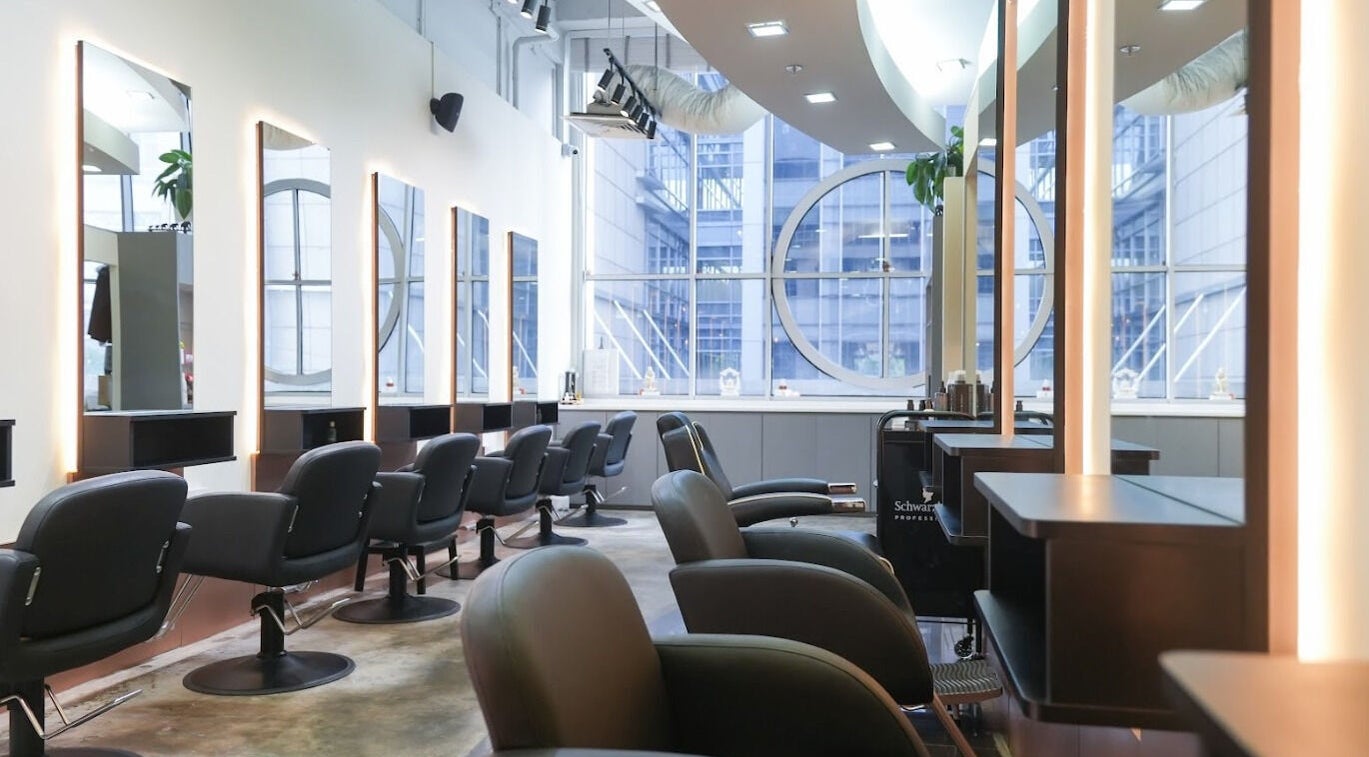 Elegant interior of Perfect Style Salon in Singapore, Singapore, SG featuring modern styling stations.