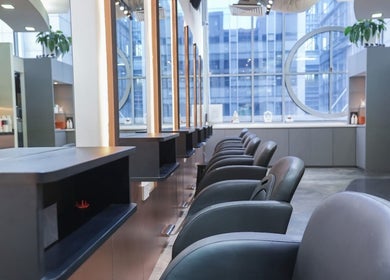 Modern interior of Perfect Style Salon in Singapore, Singapore, SG with sleek styling chairs and mirrors.