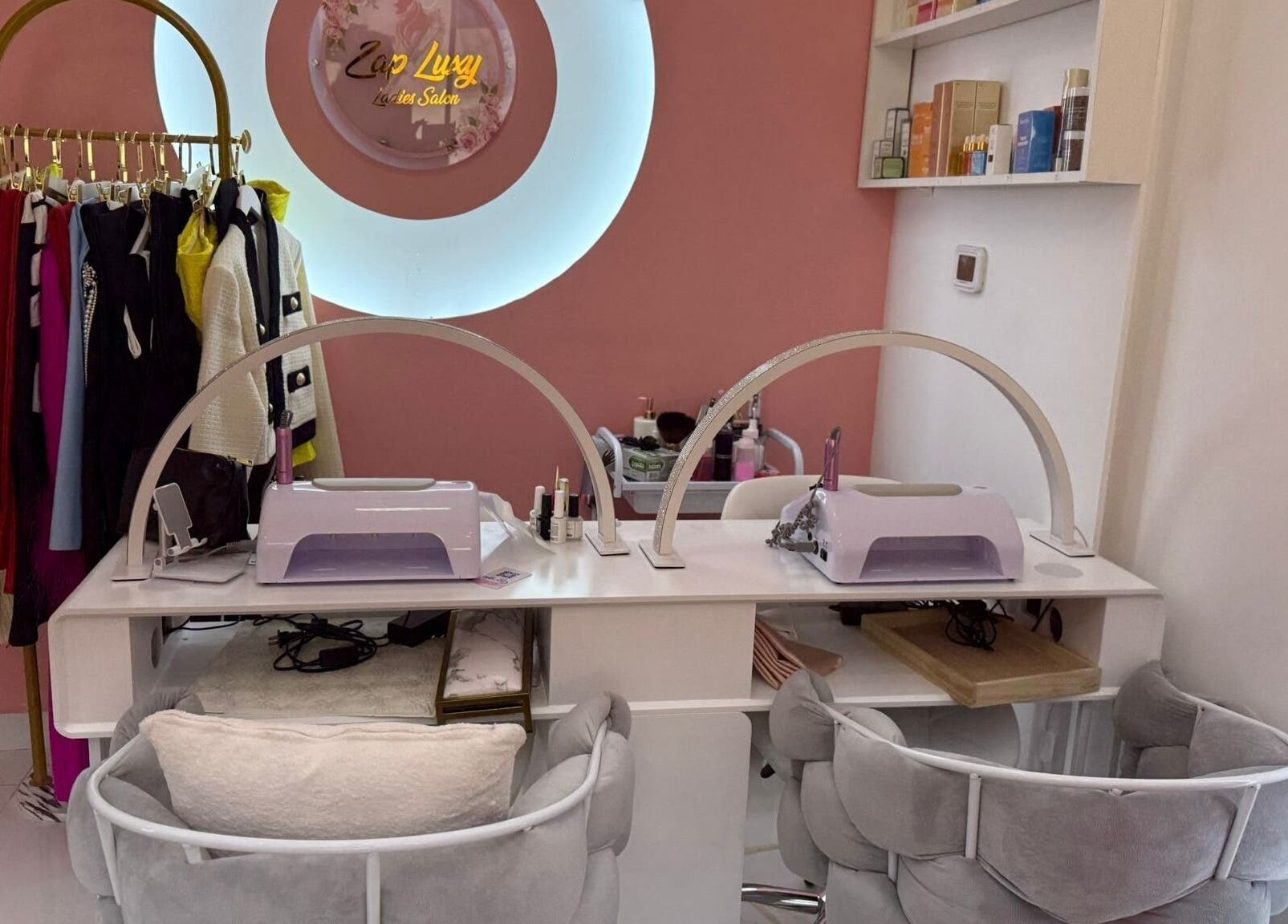 Elegant nail station at Zap Luxy Beauty Salon in Dubai, Dubai, AE with stylish decor and plush seating.
