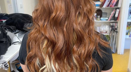Lush red waves hairstyle at Izzy.hmua in Borehamwood, GB.