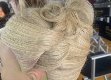 Blonde elegant updo hairstyle styled at Izzy.hmua in Borehamwood, GB salon.