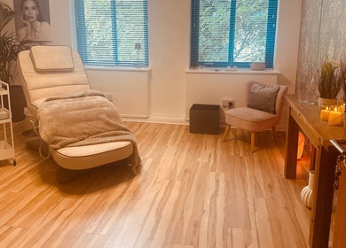Cozy therapy room at Chakra Advanced Therapies in Plymouth, England, GB, featuring a comfortable chair and soothing decor.