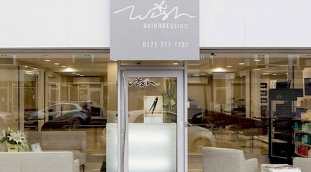 Entrance of OMBrow salon in Birmingham, England, GB showcasing a modern, inviting facade.