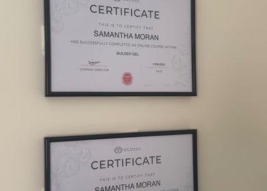 Framed certificates at Polished Nails & Beauty, Worcester, GB, showcasing professional achievements.