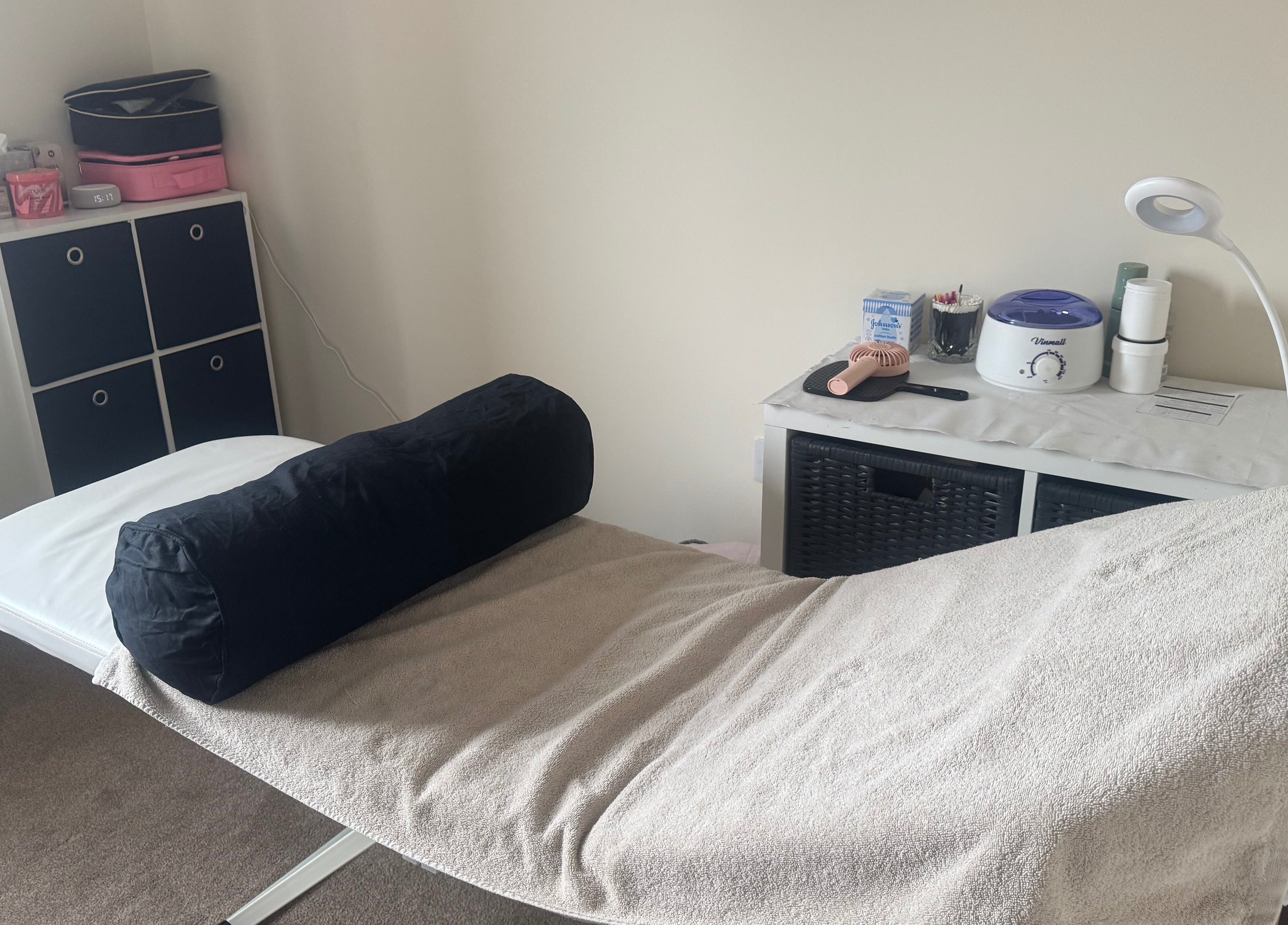 Treatment room at Polished Nails & Beauty in Worcester, GB featuring a comfortable massage bed and tools.