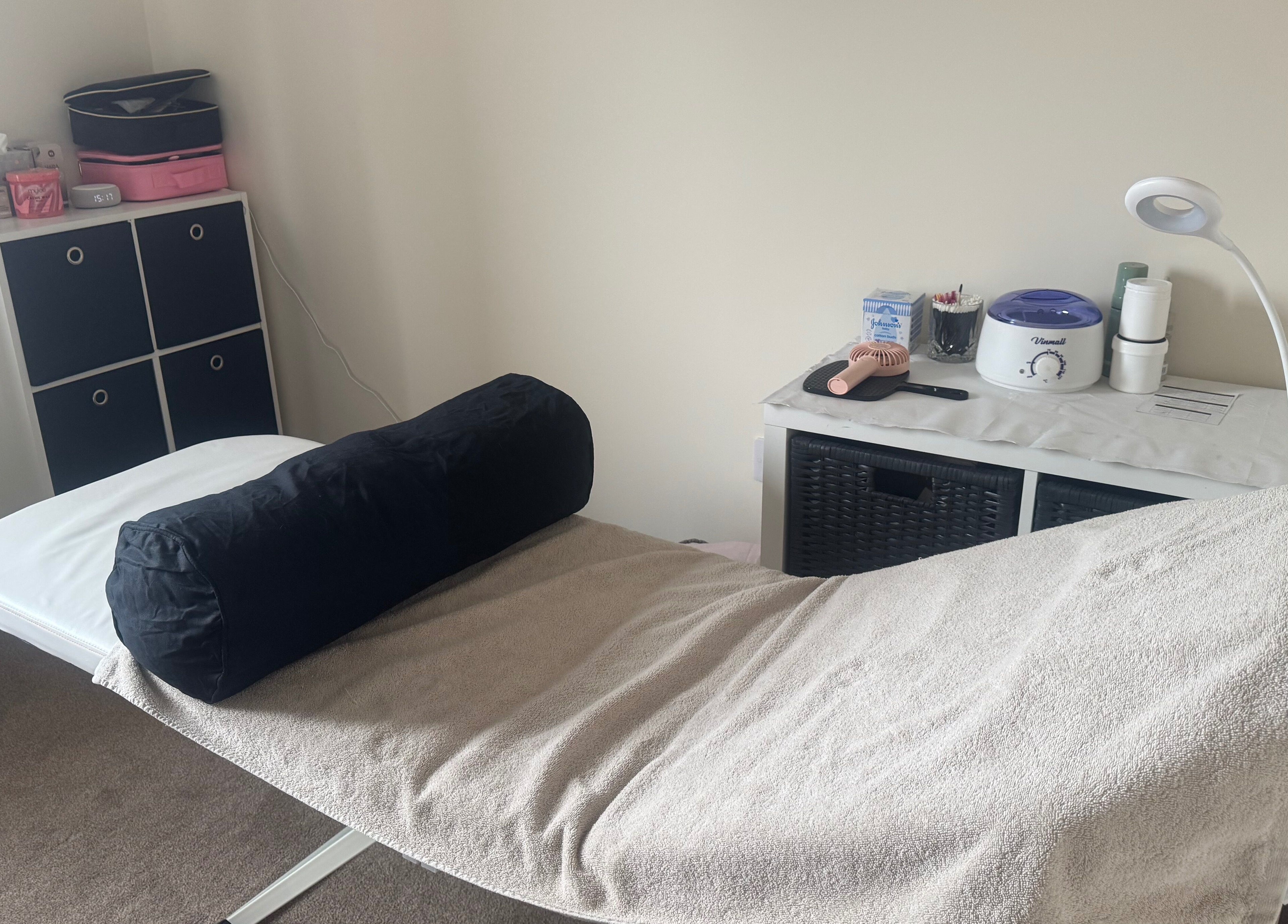 Treatment room at Polished Nails & Beauty in Worcester, GB featuring a comfortable massage bed and tools.