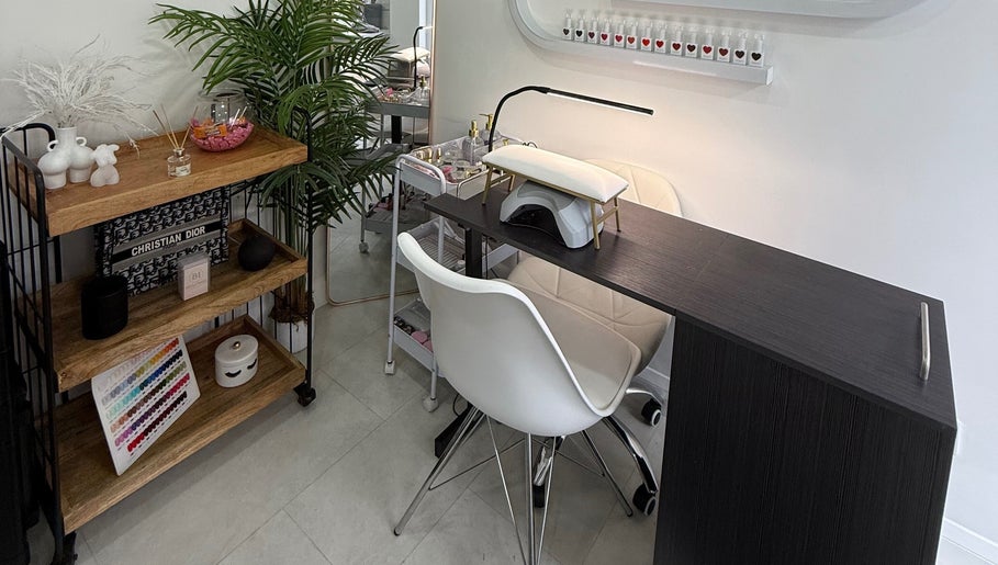 Modern nail station at Beaumeibeauty, Broxbourne, England, GB showcases elegant decor and sleek design.