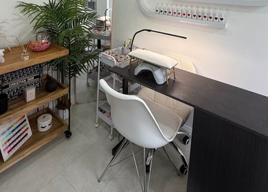 Modern nail station at Beaumeibeauty, Broxbourne, England, GB showcases elegant decor and sleek design.