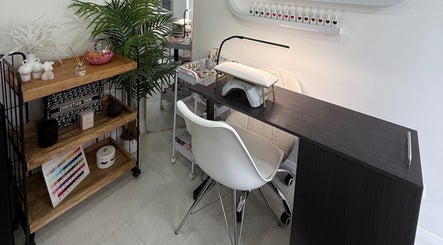 Modern nail station at Beaumeibeauty, Broxbourne, England, GB showcases elegant decor and sleek design.