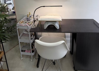 Modern nail station at Beaumeibeauty in Broxbourne, England, GB, featuring sleek design and organized setup.