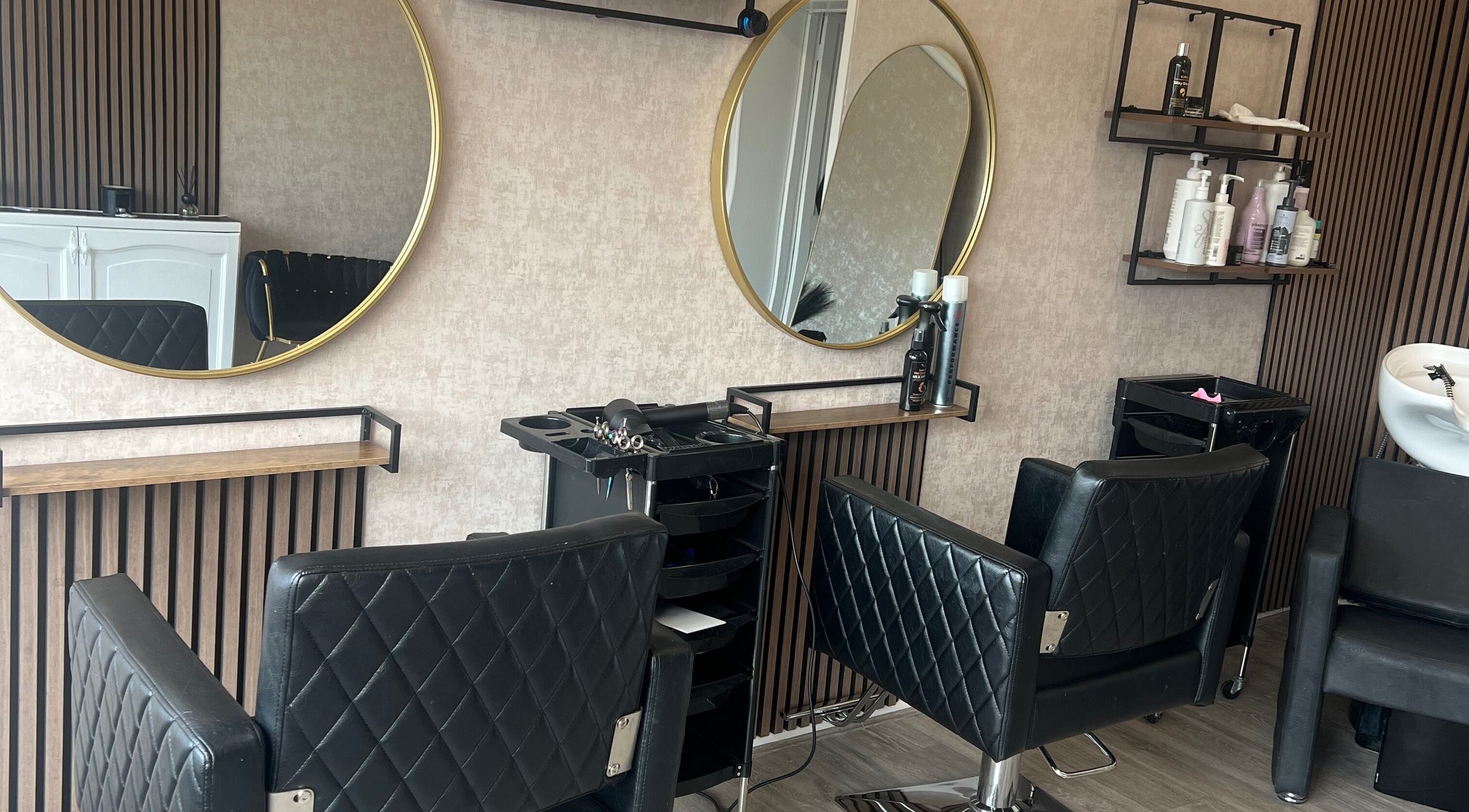 Elegant interior of AZ Hair Salon in Southport, England, GB featuring modern styling chairs and mirrors.