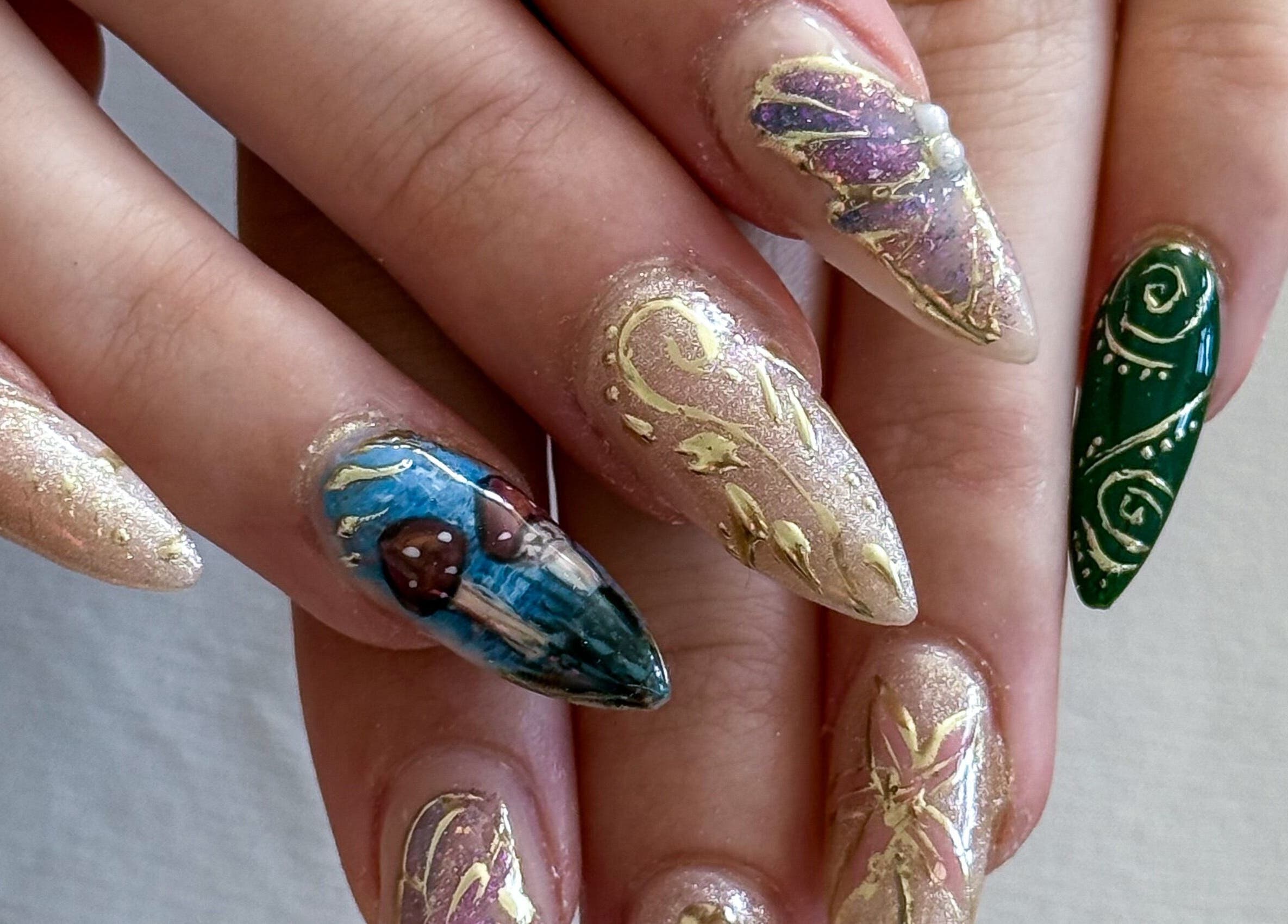 Artistic nail designs at Beauty By Mimz, Ludgvan, England, GB showcasing intricate patterns and vibrant colors.