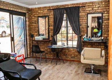 Cozy interior of Hair@Lerina in Centurion, Gauteng, ZA with stylish chairs and mirrors.