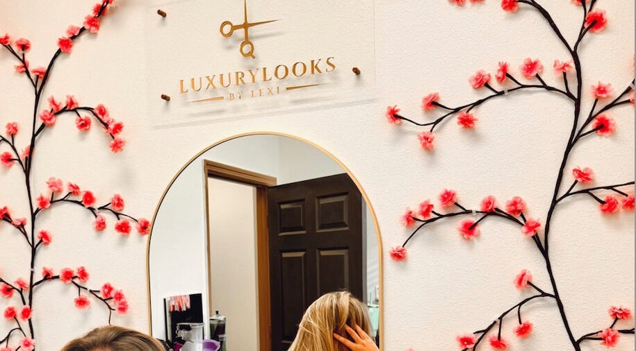 Elegant mirror with floral decor at LuxuryLooksbByLexi, New Port Richey, Florida, US.