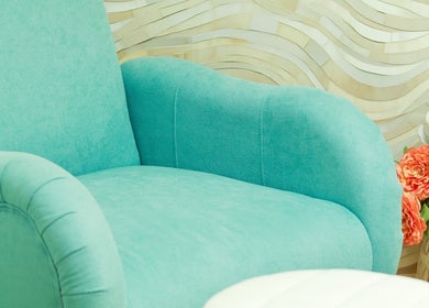 Soft turquoise chair at SkinSation Endospheres Wellness & Massage, Mount Pleasant, South Carolina, US.