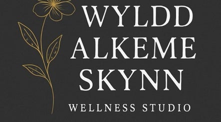 Wyldd Alkeme Skynn Wellness Studio logo with a floral design in Fort St. John, British Columbia, CA.