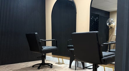 Modern salon chairs at STUDIO B. BRUCE JOHNSTONE HAIRDRESSING in Dundee, Scotland, GB.