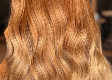 Flowing golden hair expertly styled at Studio B – Bruce Johnstone Hairdressing, Dundee, Scotland, GB.