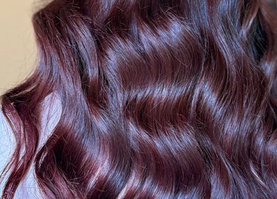 Rich, shiny brown hair with cascading waves at Studio B – Bruce Johnstone Hairdressing, Dundee, Scotland, GB.