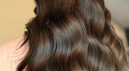Luxurious brown wavy hair styled at Studio B – Bruce Johnstone Hairdressing, Dundee, Scotland, GB.
