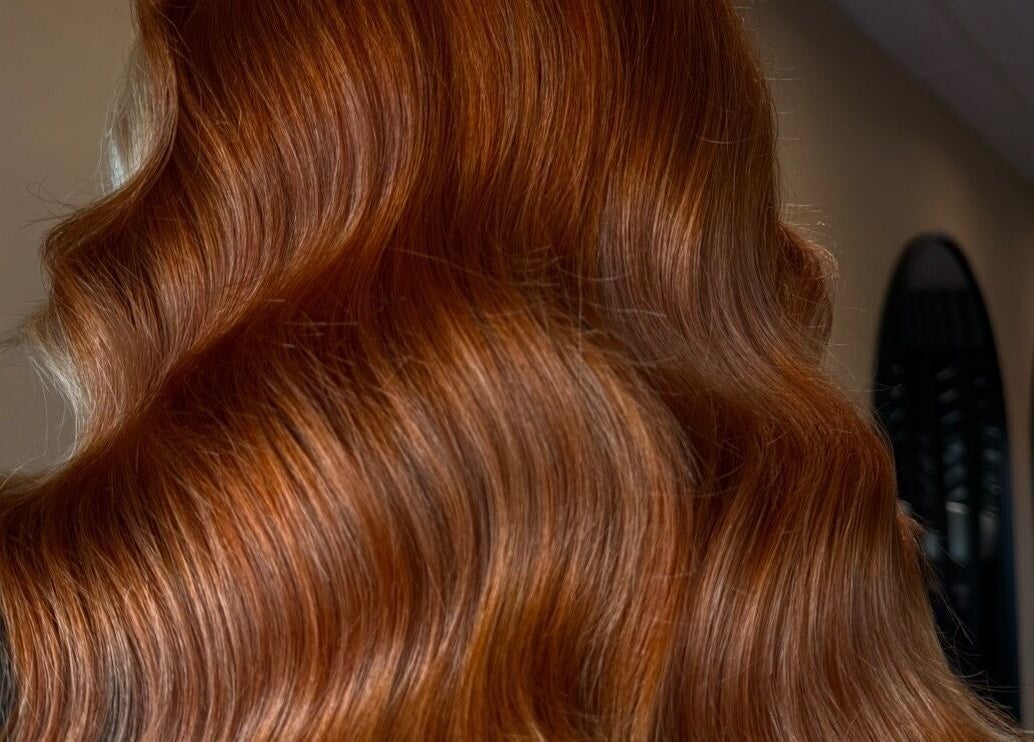Vibrant copper hair waves styled at Studio B – Bruce Johnstone Hairdressing, Dundee, Scotland, GB.