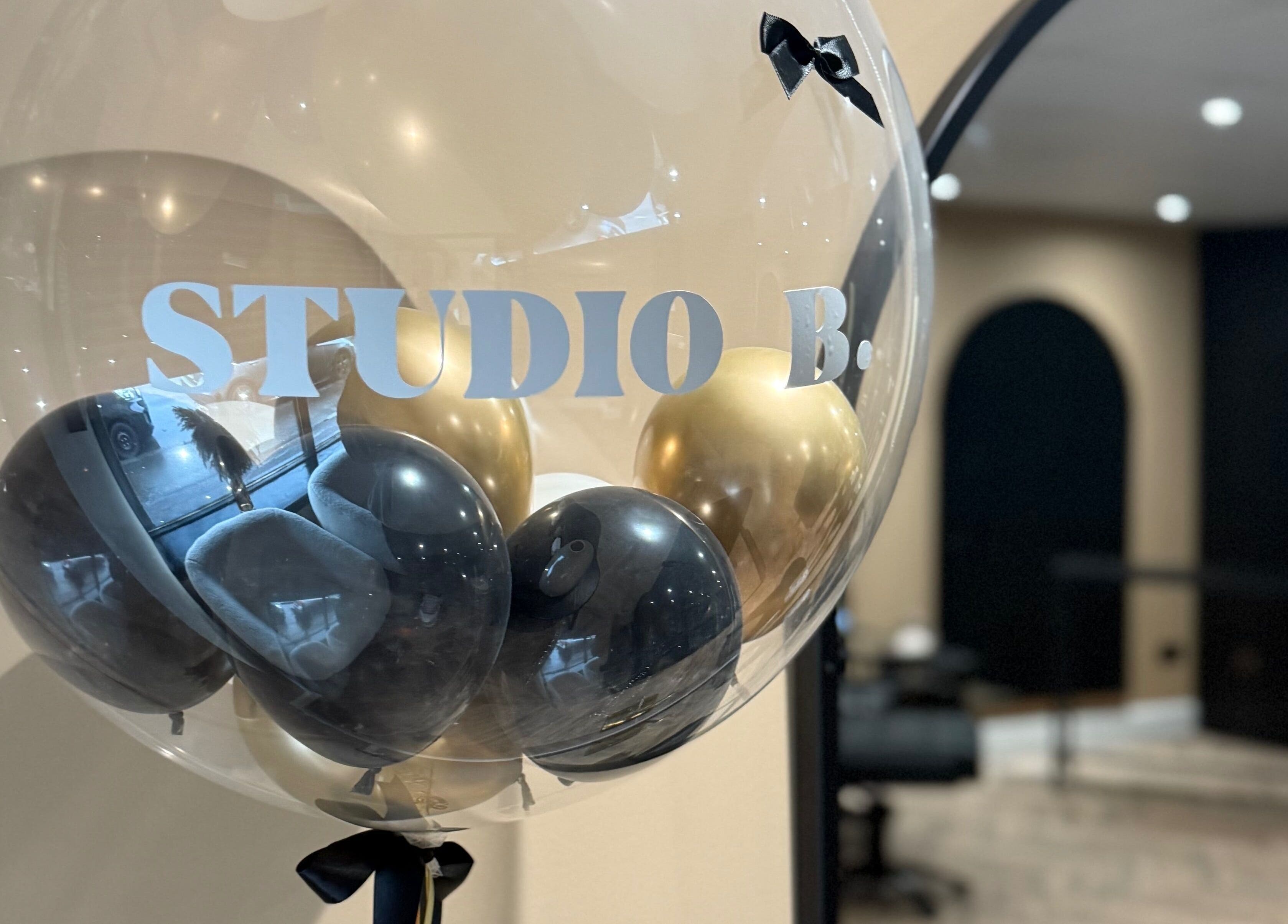 Balloon decor at Studio B – Bruce Johnstone Hairdressing in Dundee, Scotland, GB, showcasing chic interior.