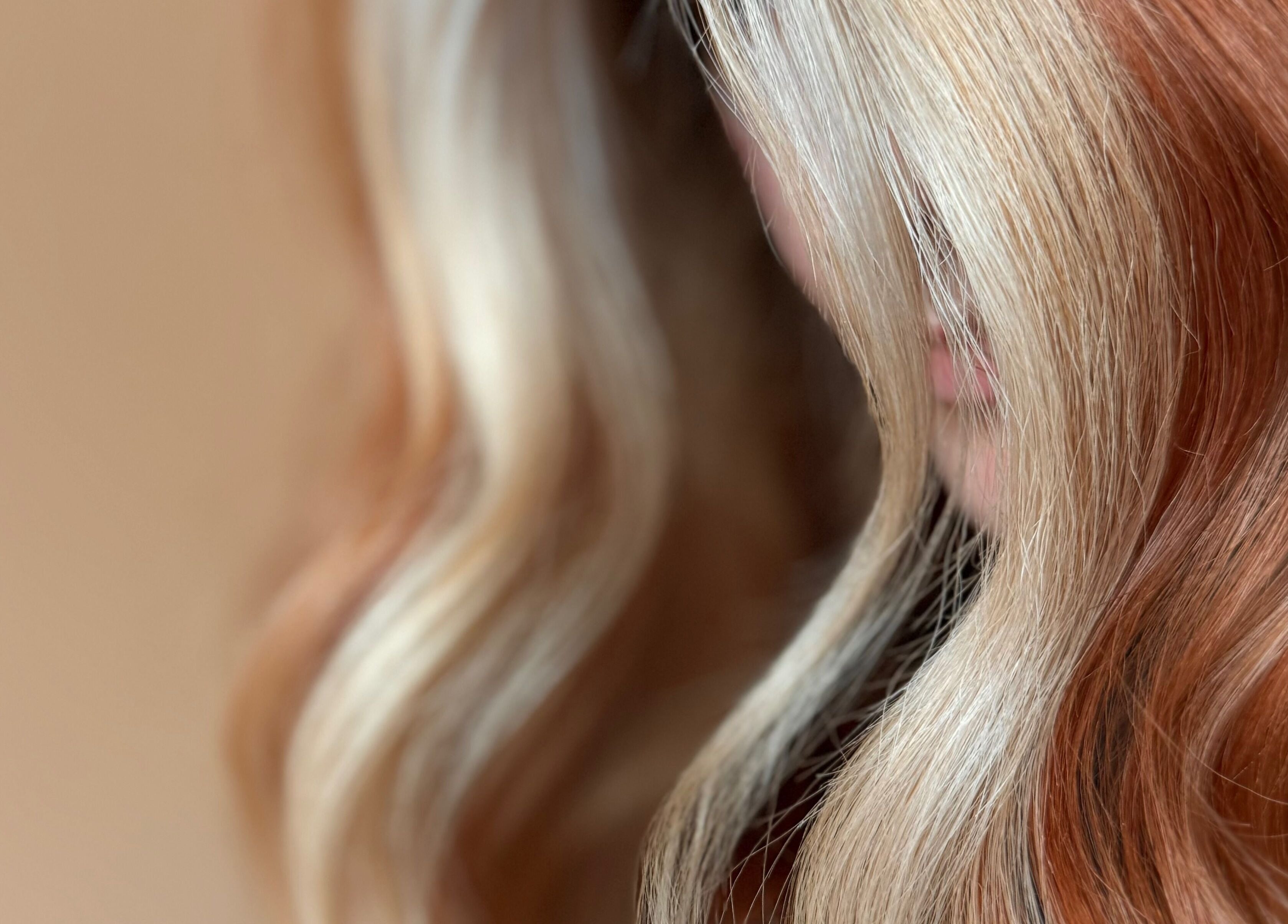 Close-up of wavy hair styled at Studio B – Bruce Johnstone Hairdressing, Dundee, Scotland, GB.