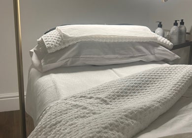 Luxurious treatment bed at Skin Space by Lauren, Worsley, England, GB, showcasing ultimate relaxation.