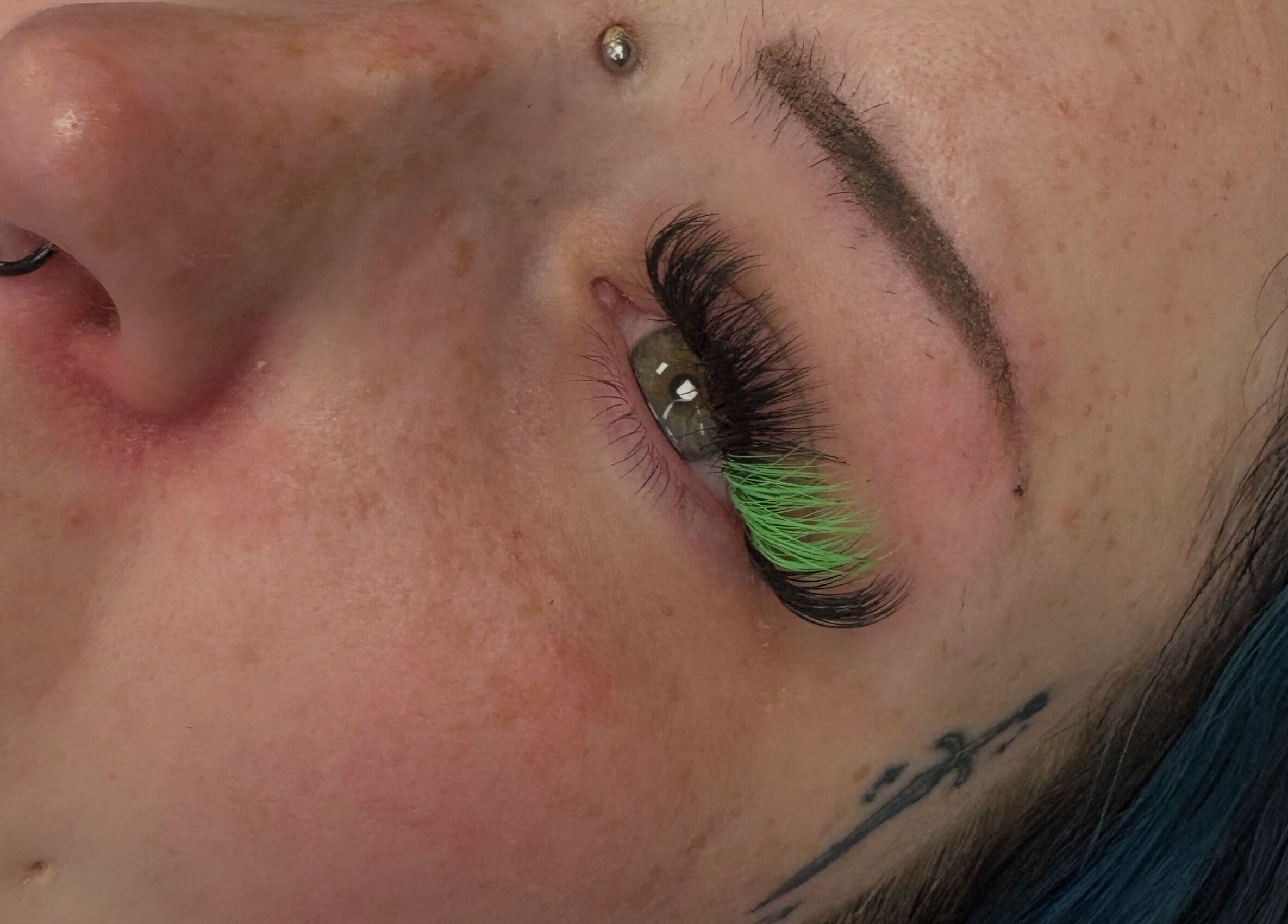 Colorful eyelash extensions at Lashesbyjazminexo in Parkgate, England, GB showcasing intricate detail.