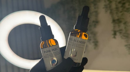 Close-up of skincare serums at SkinCure, Castleford, England, GB, highlighting Pure Peel and Peel Blender bottles.