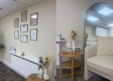 Cozy wellness space at SkinCure in Featherstone, England, GB featuring elegant decor and relaxing seating.