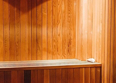 Cozy wooden sauna interior at Zencure in Richmond, British Columbia, CA for relaxation and wellness.