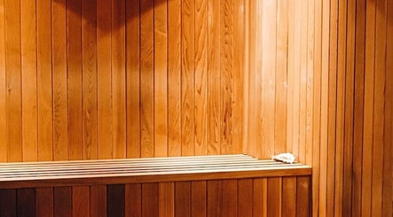 Cozy wooden sauna interior at Zencure in Richmond, British Columbia, CA for relaxation and wellness.