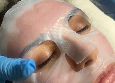 Facial treatment at The Daily Glow LLC, Tuscaloosa, Alabama, US with soothing face mask.