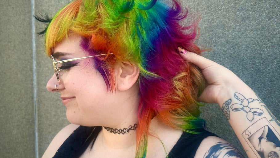 Vibrant rainbow hairstyle created at Rainbows By Mariana, Rockford, Illinois, US showcases bold colorful flair.
