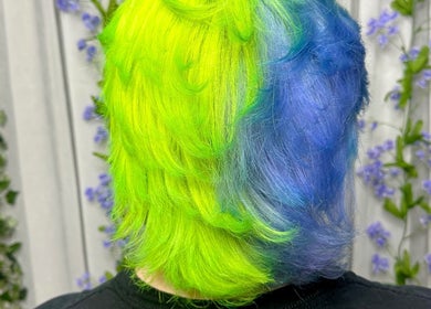 Bright green and blue hair at Rainbows By Mariana, Rockford, Illinois, US, showcasing a vivid style.