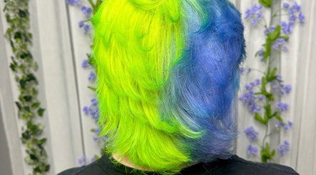 Bright green and blue hair at Rainbows By Mariana, Rockford, Illinois, US, showcasing a vivid style.