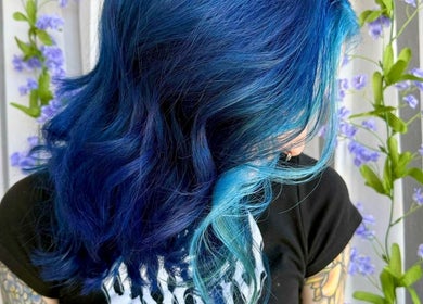 Vibrant blue hair waves at Rainbows By Mariana, Rockford, Illinois, US. Effortlessly chic and stylish look.
