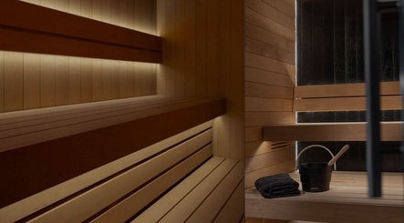 Elegant sauna at Recovery Hive, Coolum Beach, Queensland, AU, offering a tranquil wellness experience.