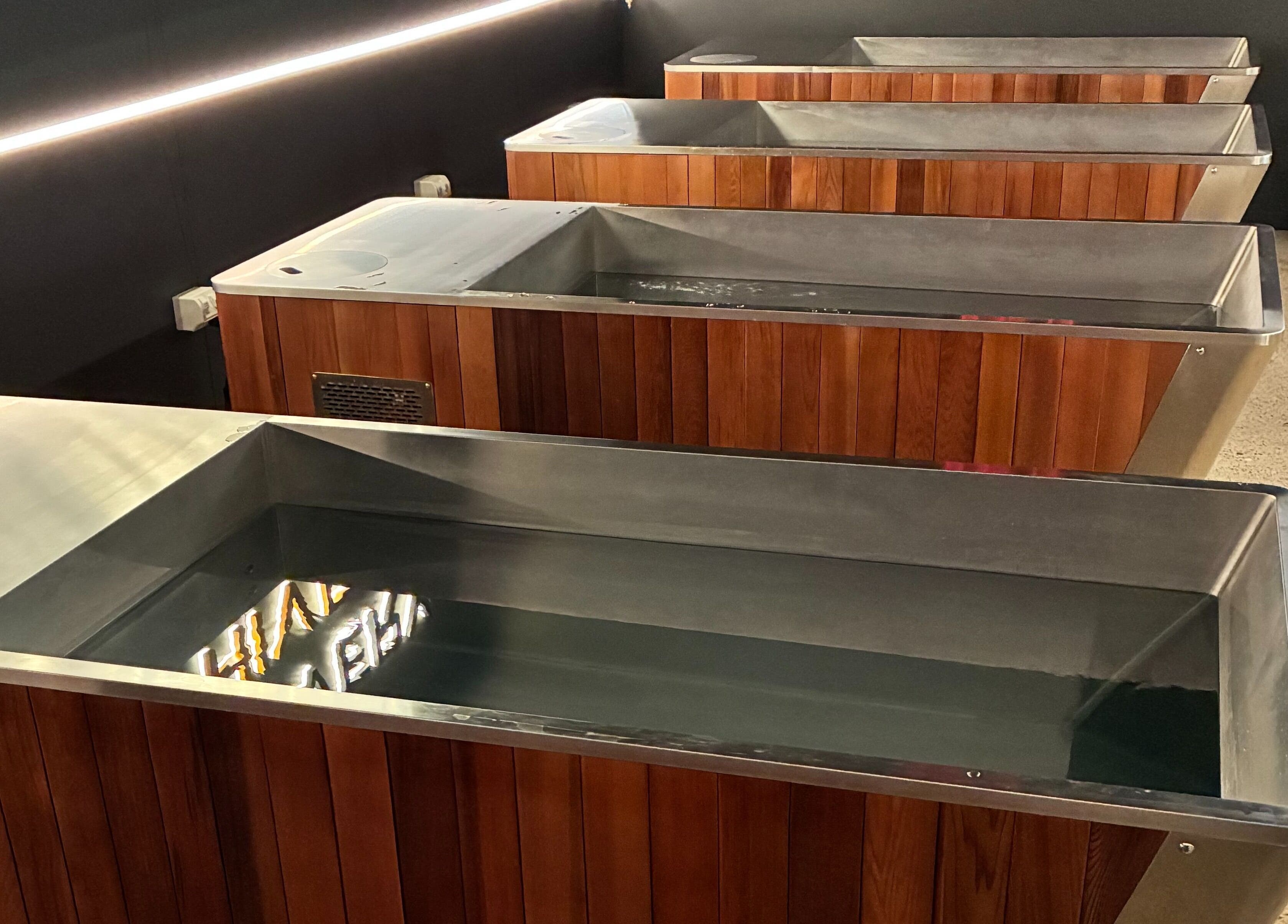 Relaxing wooden soak tubs at Recovery Hive, Coolum Beach, Queensland, AU for rejuvenation and wellness.