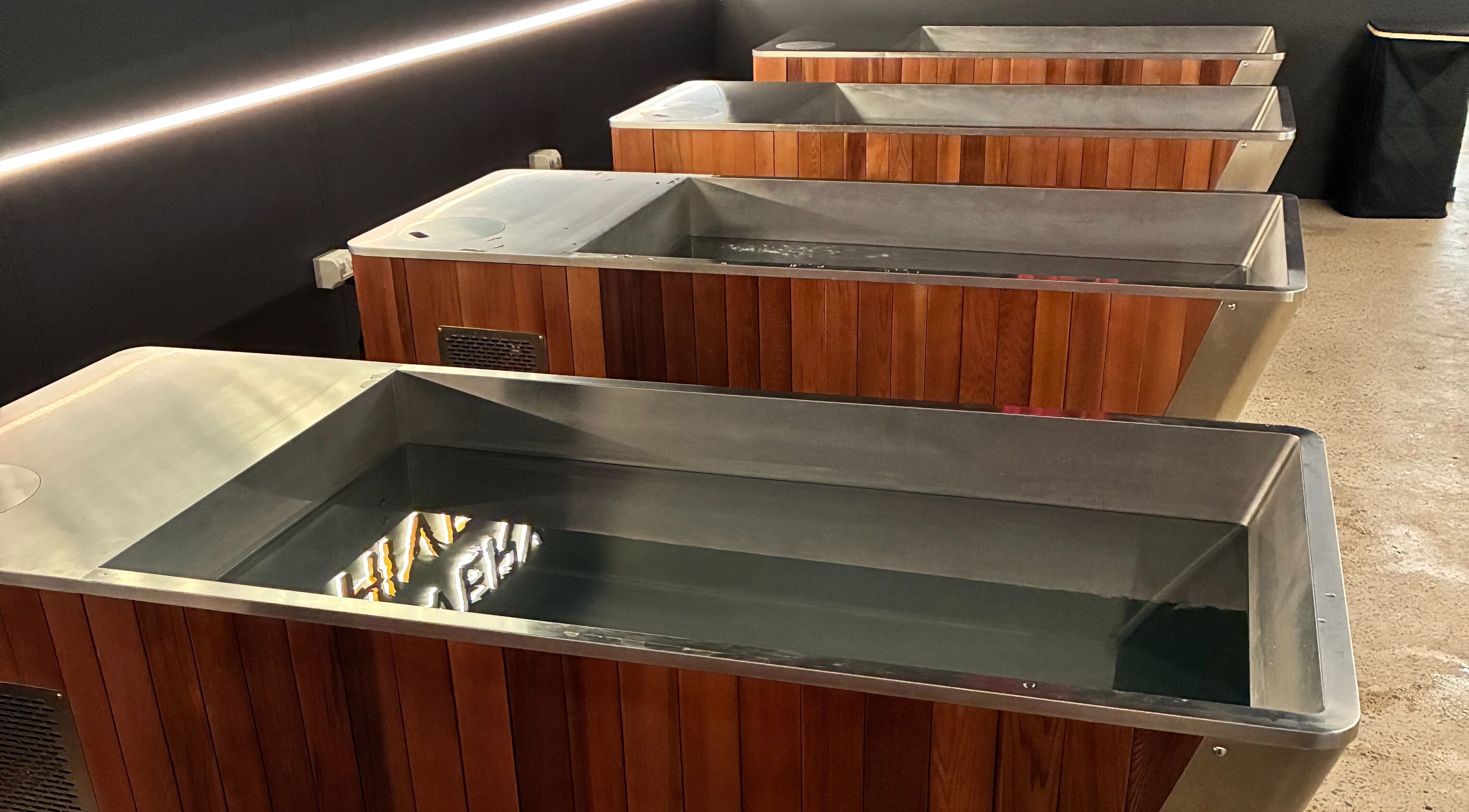 Relaxing wooden soak tubs at Recovery Hive, Coolum Beach, Queensland, AU for rejuvenation and wellness.