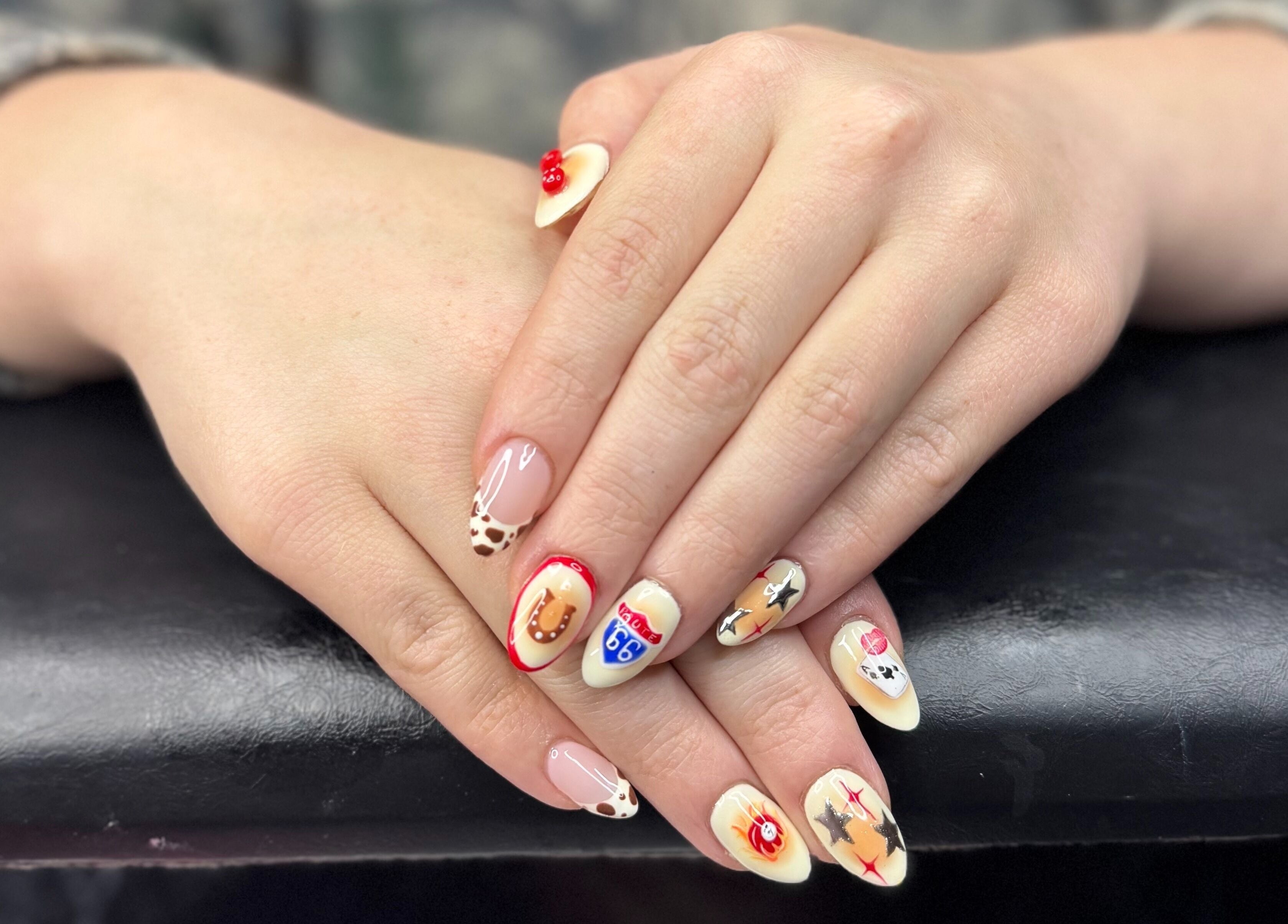 Intricate nail art with creative design at PolishedByPaigie, Lloydminster, Alberta, CA.