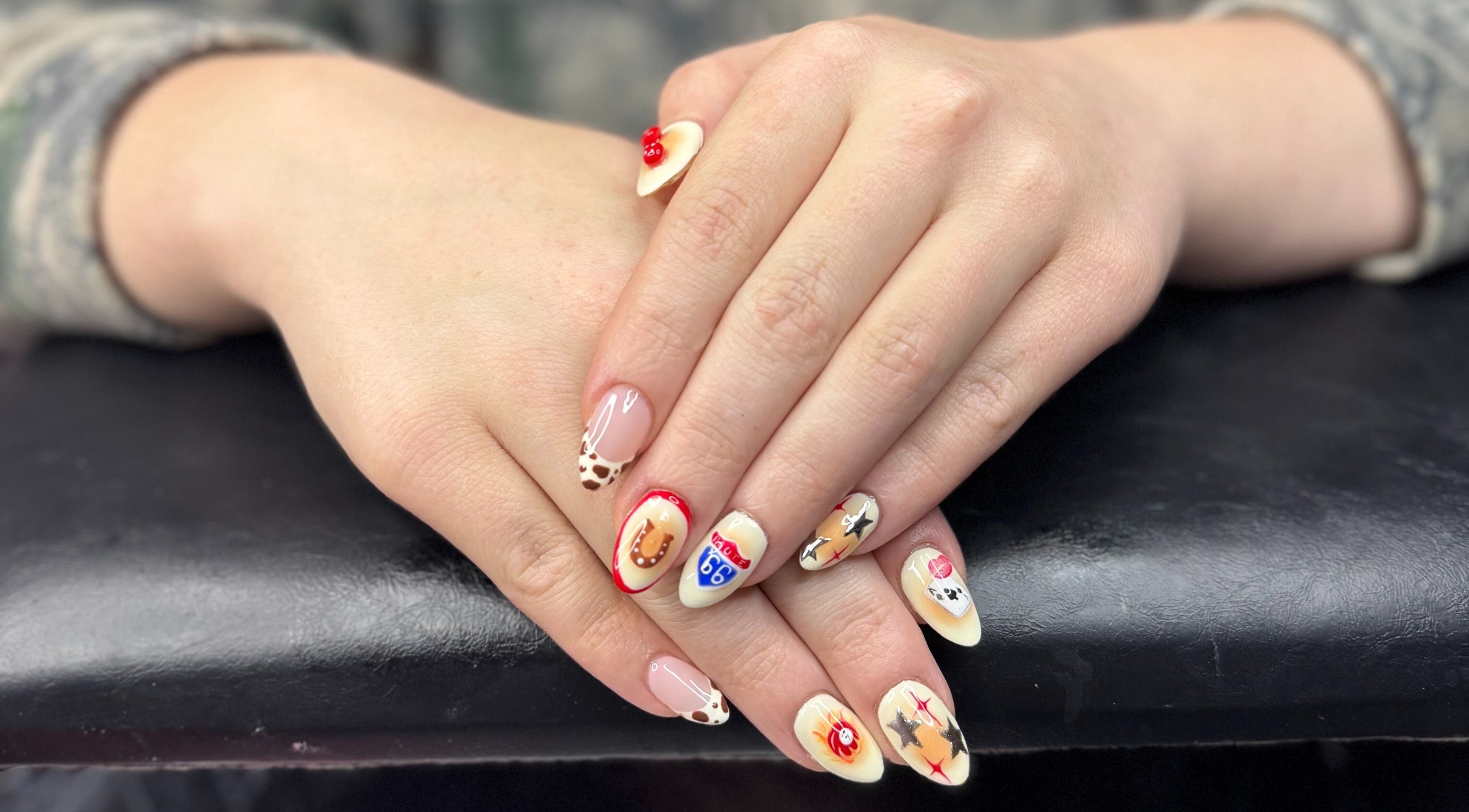 Intricate nail art with creative design at PolishedByPaigie, Lloydminster, Alberta, CA.