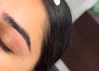 Perfectly shaped eyebrows at Luxe Wax & Facial Studio, Surrey, British Columbia, CA for a polished look.