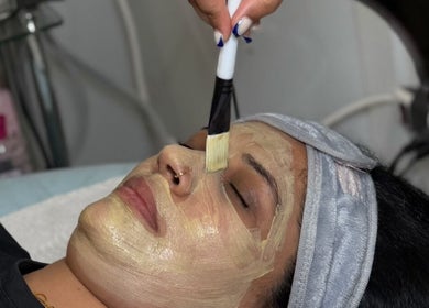 Facial treatment at Luxe Wax & Facial Studio, Surrey, British Columbia, CA, showcasing a calming mask application.