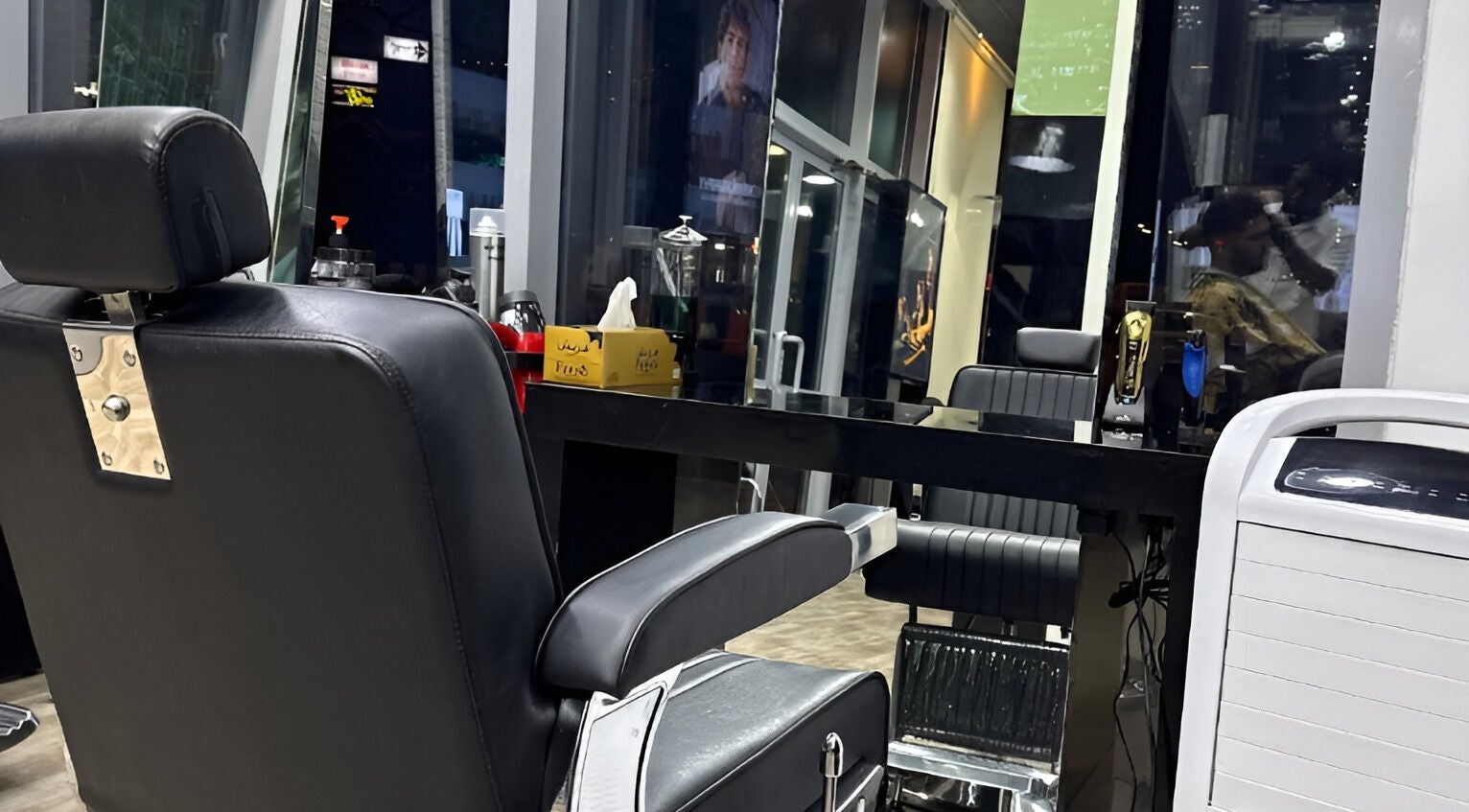 Sleek modern barber chair at Ace Barber Shop, Dubai, Dubai, AE, showcasing a luxurious grooming space.