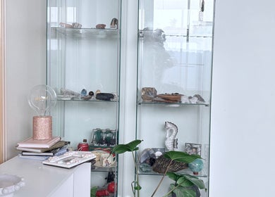 Chic decor at Lash Envy Boutique, Lake Haven, New South Wales, AU showcasing crystals and elegant shelving.