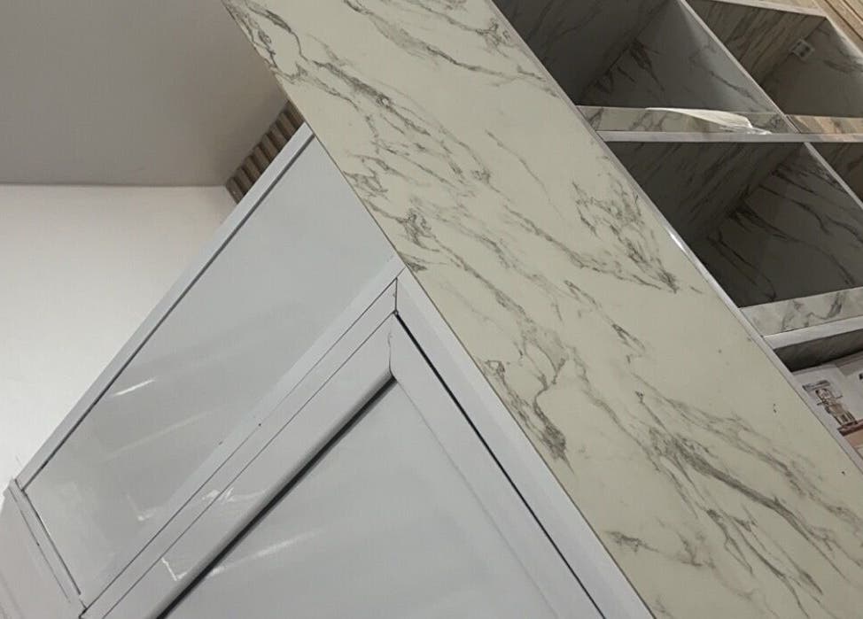 Modern marble display at Ruchicletus Beauty, Lagos, Lagos, NG, showcasing luxury beauty products.